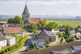 Windparks stoßen oft auf Widerstand. Doch werden die Anwohner frühzeitig eingebunden, finanziell beteiligt und transparent informiert, lässt sich Widerstand in Zustimmung verwandeln.